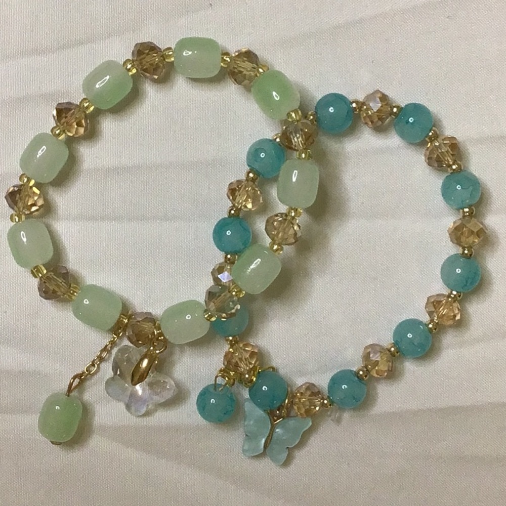 Green and Blue Beaded‎ Bracelets with Nature-Inspired Charms